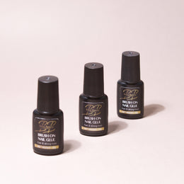 Brush on nail glue
