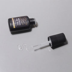 Brush on nail glue